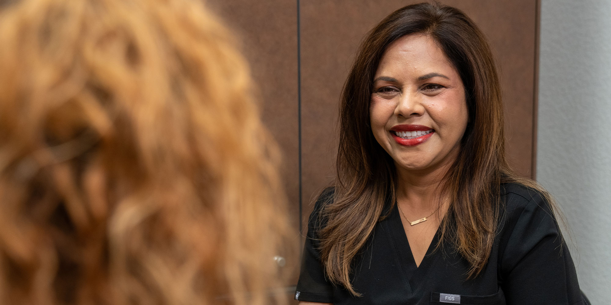 Doctor smiling consulting with Patient